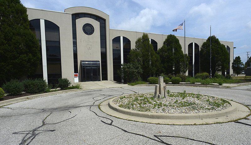 City panel OKs move to clear way for new police station
